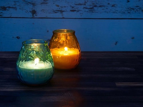 Light Citronella or Geraniol Candles for bugs