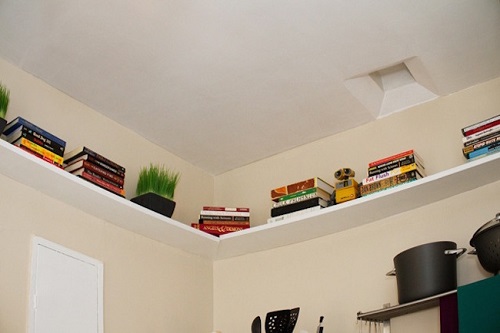 Install Shelves Along the Perimeter of Your Bedroom Walls