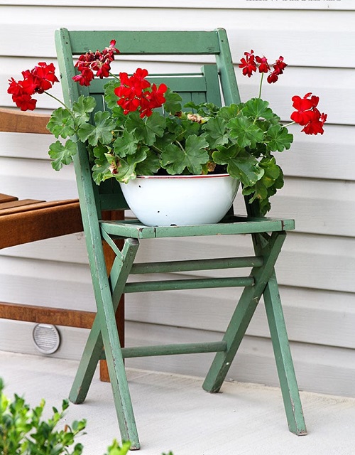 Chair With Red Geraniums