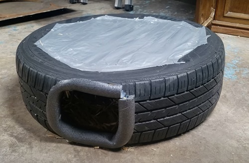 Old Tire Turned Cat Shelter