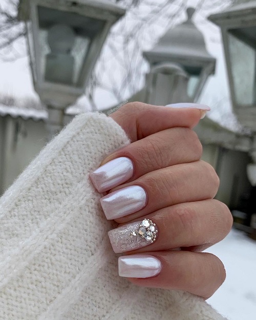 Soft White Nails With Shimmering Gemstones