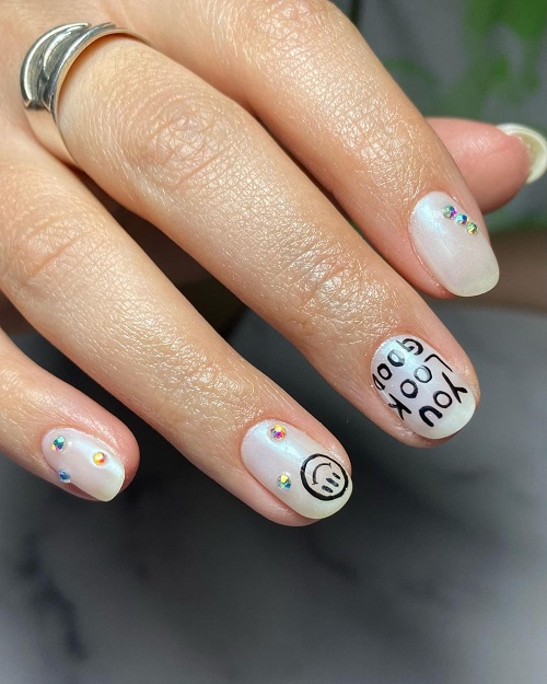 White Chrome Nails With Crystals, Quotes, and Emojis