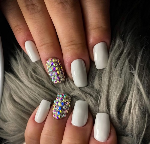 White Nails With Diamonds On Ring Finger