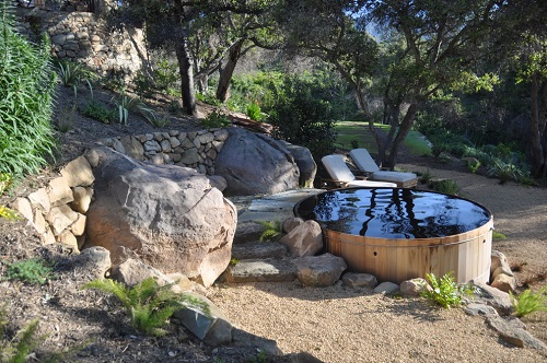 Hot Tub Surrounded with Large Rocks