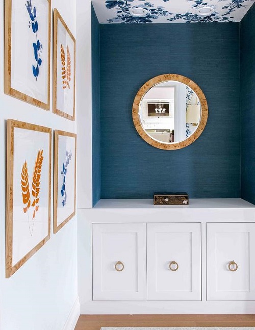 Foyer with Peacock Blue Wallpaper and Stunning Decor Pieces